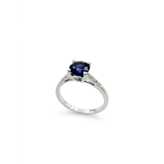 Anillo oro compromislo zafiro azul y diamantes