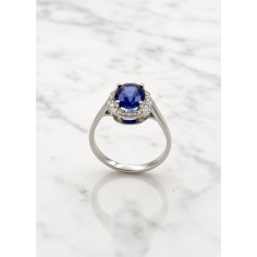 Anillo oro bl. Zafiro azul y diamantes